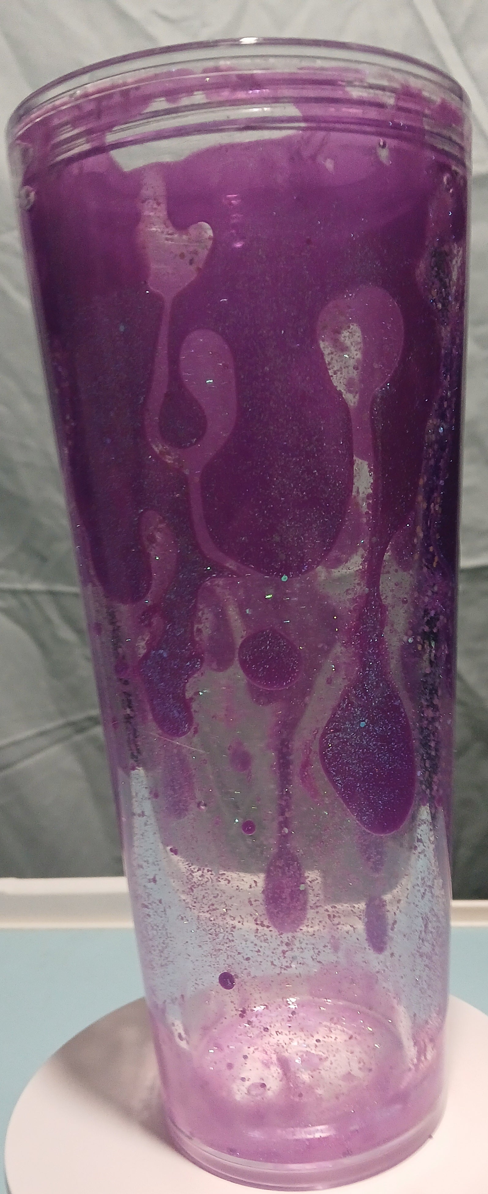 Purple glow-in-the-dark lava 24oz acrylic tumbler
